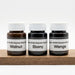 Berger-Seidle Classic ExpressStain 3 x 50ml sample pack - three 50ml sample pots on a timber plinth